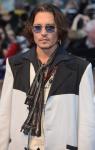 Johnny Depp Reacts to Breakup Rumors When Attending 'Dark Shadows' Premiere