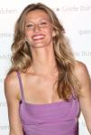 Gisele Bundchen Exposes Huge Baby Bump in a Bikini