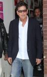 Charlie Sheen Gives $12,000 Check to Cover Justin Bieber Paparazzo's Funeral Expenses