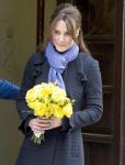 Pregnant Kate Middleton and Penelope Cruz Cover Baby Bumps in Loose Tops
