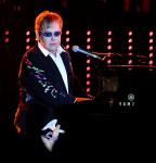 Russian Communist Group Says Elton John's Outfits Are 'Homosexual Propaganda'