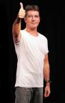 Simon Cowell Gives Homeless Man $100 at Traffic Lights