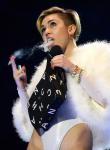 Miley Cyrus Smokes Joint as Her 'Wrecking Ball' Wins Best Video at MTV EMAs