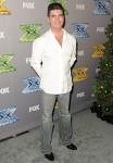 Simon Cowell Shares New Photo of Son Eric and His 'New Friends'