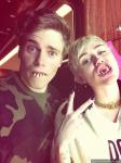 Miley Cyrus and Olympic Skier Gus Kenworthy Flash Fake Teeth in Selfie