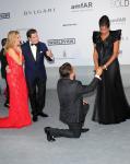 John Travolta and Kelly Preston Smile While Watching Friend Propose to Girlfriend in Cannes