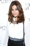 Eva Mendes Hides Baby Bump in First Photos Since Pregnancy Rumor