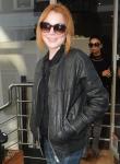 Lindsay Lohan Shares a Kiss With Her Manager in Italy
