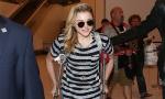 Chloe Moretz Wears Knee Brace, Walks on Crutches at LAX
