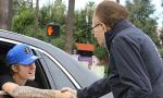 Justin Bieber Stops His Car to Shake Hands With Larry King