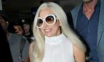 Lady GaGa Hides Her Engagement Ring as She Strolls Through LAX