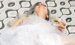 Lady GaGa Relaxes on Floor and Sips Martini After Oscar Performance
