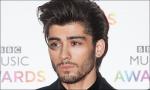 Zayn Malik Leaves Stage Early After Falling Ill During One Direction's Concert