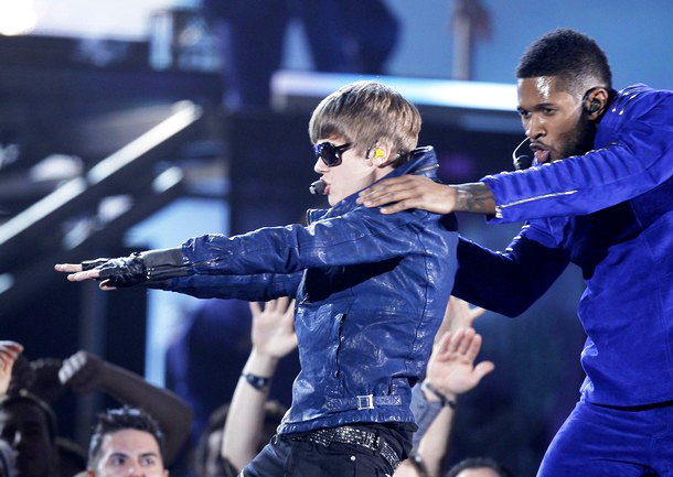 Justin Bieber and Usher show a justin bieber usher grammy. Justin Bieber and Usher show a
