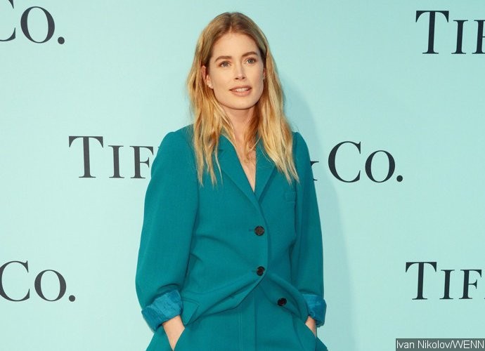 A Cheeky Man Outshines Doutzen Kroes During Bikini Photo Shoot by B...