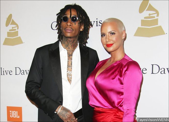 Amber Rose Addresses Relationship With Ex-Hubby Wiz Khalifa After That Kissing Pic
