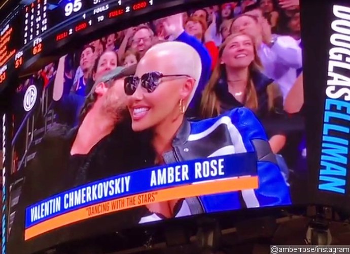 Amber Rose Left Blushing After Beau Val Chmerkovkiy Kisses Her at NY Knicks Game