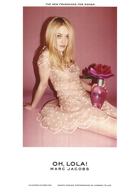 ASA Bans Ad of Dakota Fanning With Bottle Between Her Legs