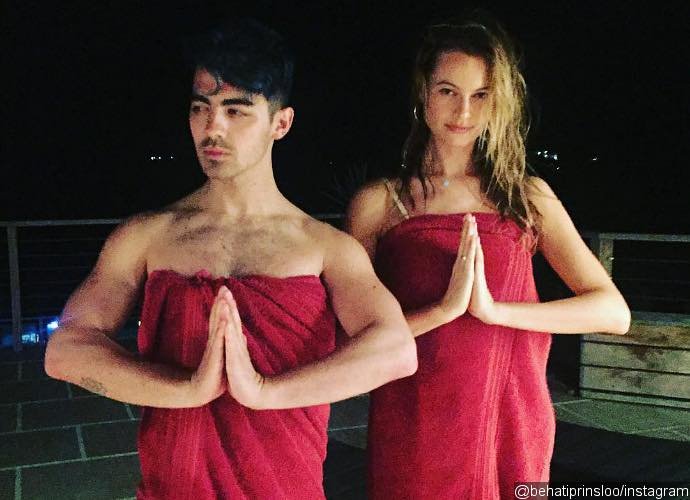Behati Prinsloo and Joe Jonas Look Wet and Wear Matching Towels