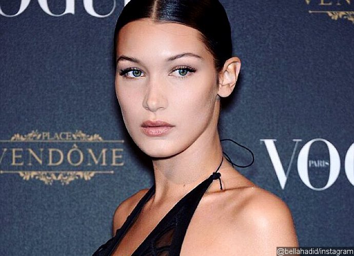 Bella Hadid Shows Nipple Piercing in Barely-Covering Dress
