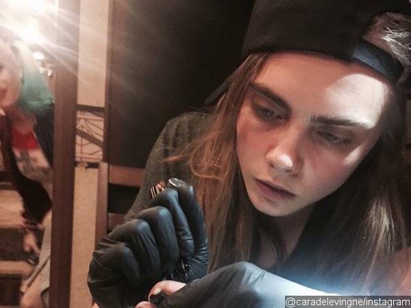 Cara Delevingne Gets and Gives 'Suicide Squad' Tattoo
