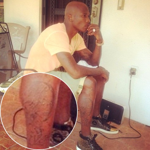  Tattoos on Chad Ochocinco Flaunts New Tattoo Of Evelyn Lozada S Face On His Leg