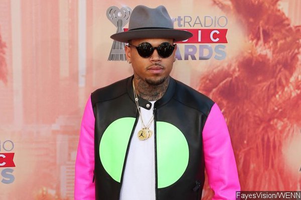 Chris Brown Gets Venus De Milo Tattoo on His Head