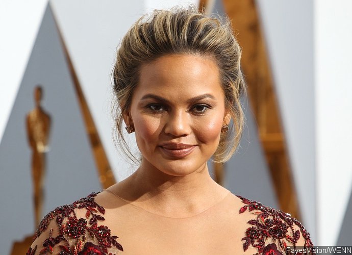 Chrissy Teigen: 'No One Told Me I Would Be Coming Home in Diapers Too'