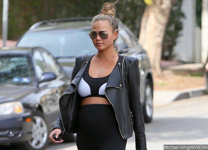 What a Gorgeous Mom-to-Be! Chrissy Teigen Shows Off Baby Bump in Sports Bra