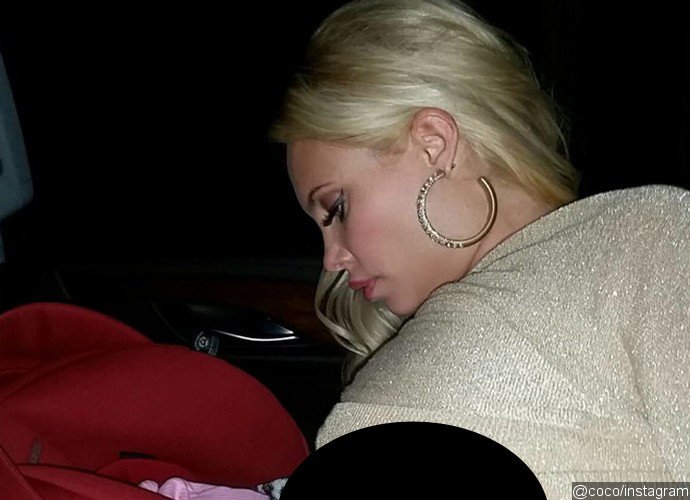 Coco Austin Awkwardly Breastfeeds Her Baby in Her Car Seat