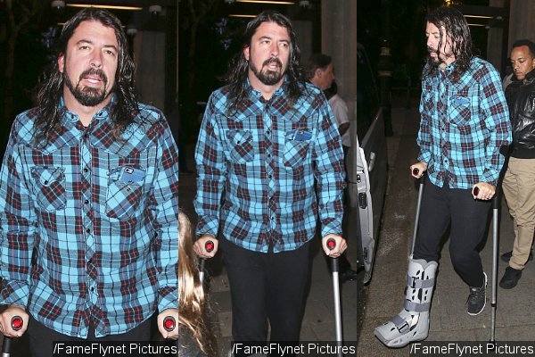 Dave Grohl Resurfaces With Crutches After Leg Injury in Sweden