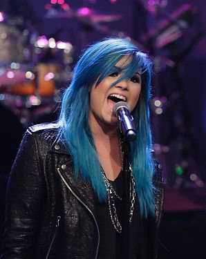 http://www.aceshowbiz.com/images/news/demi-lovato-debuts-new-blue-hair-while-performing-neon-lights-on-jay-leno-s-show.jpg