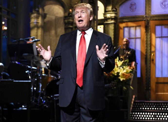 Donald Trump Gets Heckled During 'SNL' Monologue, Dances to 'Hotline Bling'