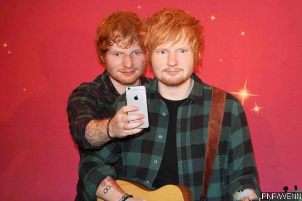 Ed Sheeran Can't Resist Taking Selfies With His Wax Figure