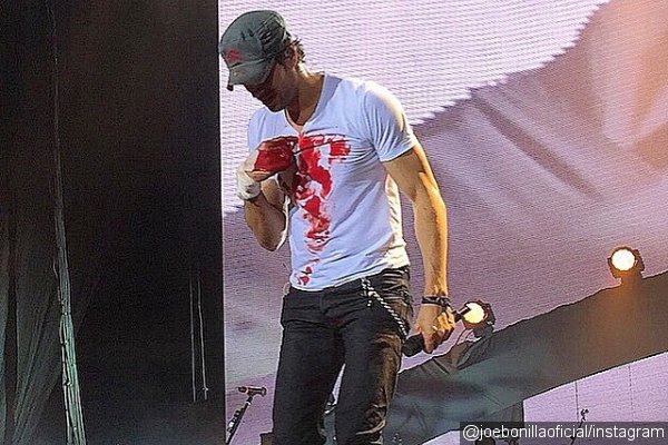 enrique-iglesias-performs-with-bloody-hand-after-slicing-his-fingers-on-drone-onstage.jpg