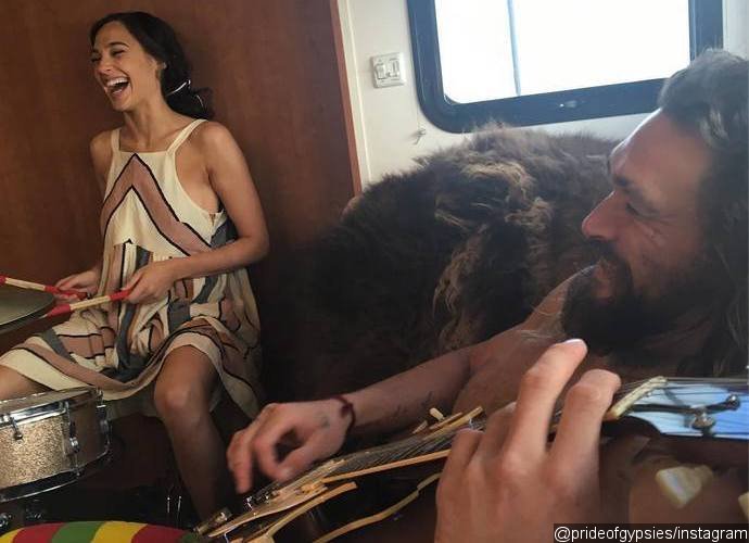 Gal Gadot and Ezra Miller Rock It Out on Set of 'Justice League'