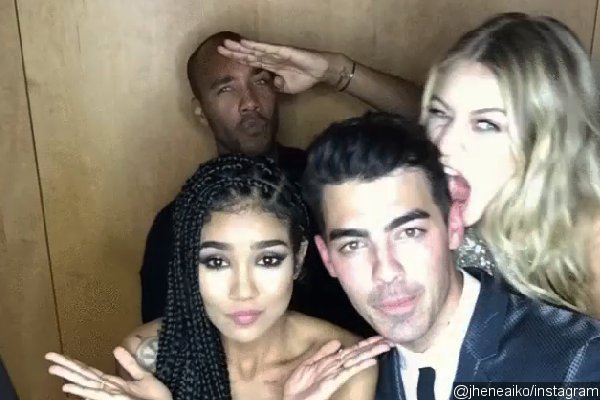 Gigi Hadid Bites Joe Jonas in Photo Booth Amid Dating Rumors