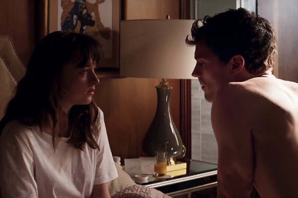 Jamie Dornan Tells Dakota Johnson He 'Doesn't Do Romance' in New 'Fifty Shades of Grey' Clip