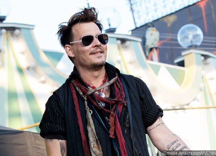 Johnny Depp Has Amber Heard Nickname Tattoo Altered Into 'SCUM' Amid Bitter Divorce