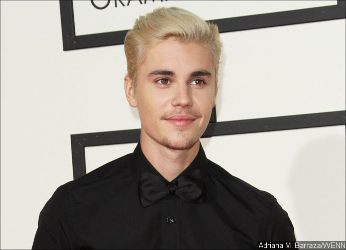 Justin Bieber Forks Out Little Money to Settle Paparazzo Lawsuit