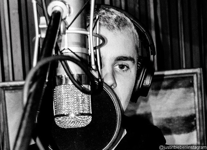 Justin Bieber Teases New Music With Studio Photos