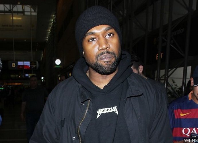 Kanye West Breaks Up Paparazzi Fight at LAX