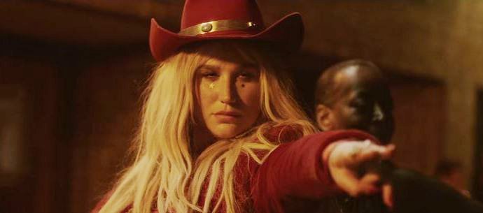 Kesha Is Total Bada** in 'Woman' Music Video