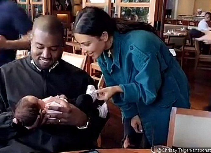 Kim Kardashian and Kanye West Cradle Chrissy Teigen and John Legend's Baby During Brunch