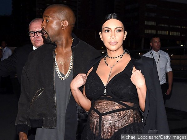 Kim Kardashian Barely Covers Growing Baby Bump at Givenchy's First NYFW Show