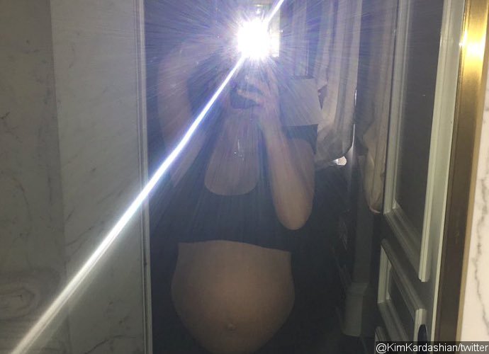 Kim Kardashian Bares Baby Bump as She's 'Ready' to Give Birth Anytime
