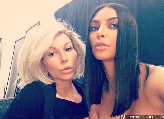 Kim Kardashian Debuts Shorter Hair While Flaunting Her Cleavage in Tiny Bustier