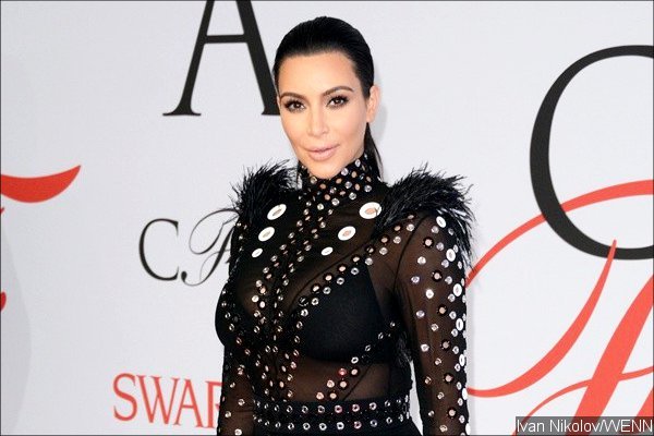 Kim Kardashian Denies She Is Pregnant With Baby Boy