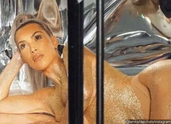Nearly-Naked Kim Kardashian Flashes Famous Derriere in BTS Pics From KKW Beauty Photoshoot