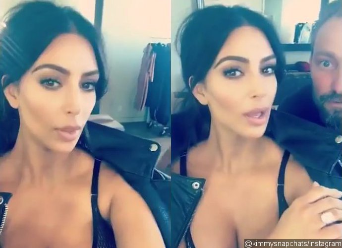 Kim Kardashian Flaunts Ample Cleavage in Black Bra